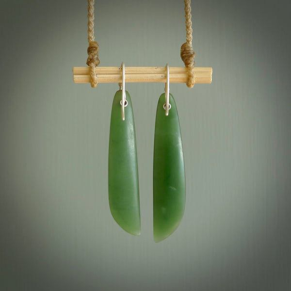 These are stunning large wing shaped drop jade earrings carved in New Zealand by Josey Coyle. It is carved from a apple green piece of New Zealand Jade and with Sterling Silver hooks.