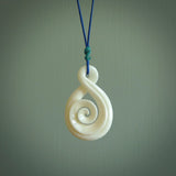 Hand carved bone twist with koru pendant. Real natural bone. These are suspended on a length adjustable plaited cord.