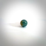 Hand carved jade ball ring with sterling silver. Carved for NZ Pacific by Ana Krakosky here in New Zealand. Carved from real Guatemalan Jade and Sterling Silver. This is a one only ring available, delivered with DHL Express Courier.