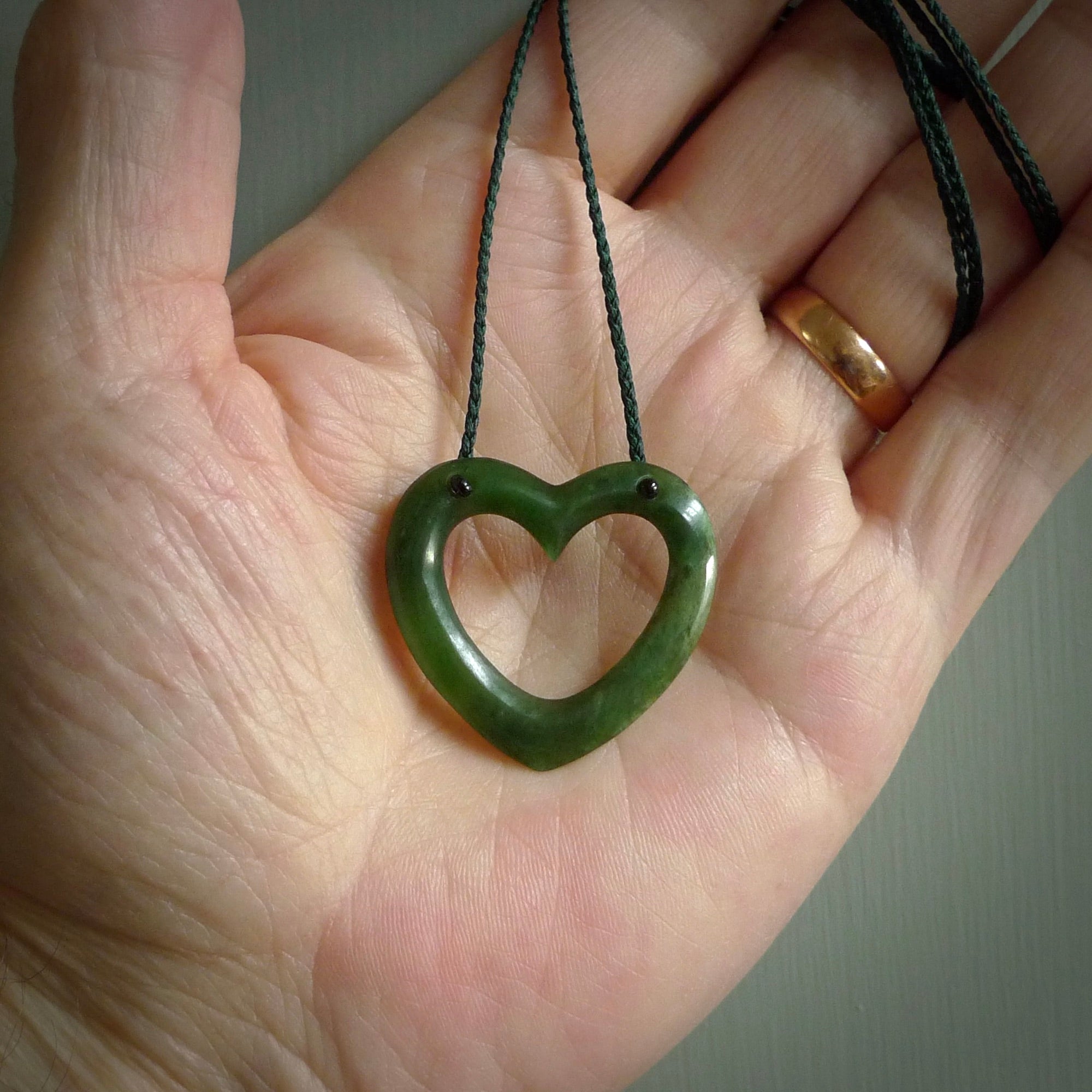 This is a wonderfully fine, hand-carved heart pendant, made from the finest quality New Zealand jade. These are provided with a fine, hand-plaited cord which is adjustable so that you can position the pendant where it suits you best. These are delivered with free shipping worldwide.