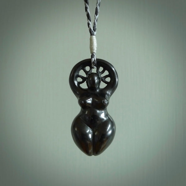 This medium sized Venus woman with tree of life head pendant is made from Red Black Jade Stone. We've hand carved this piece for all the lovers out there. Free postage worldwide. Black Jade Stone goddess, woman with tree of life jewellery.