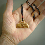 Hand carved whale tail pendant. Carved from woolly mammoth tusk in 10,000 year old mammoth tusk. A rare and original handmade pendant for ocean lovers.