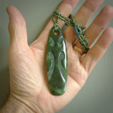 Hand made large New Zealand jade purerehua with koru pendant. Hand carved in New Zealand by Kerry Thompson. Hand made jewellery. Unique large Jade pendant with adjustable cord. Free shipping worldwide.