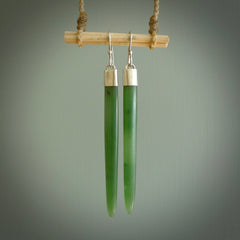 These are stunning large wing shaped drop jade earrings carved in New Zealand by Josey Coyle. It is carved from a deep green piece of New Zealand Jade and with Sterling Silver hooks and findings.