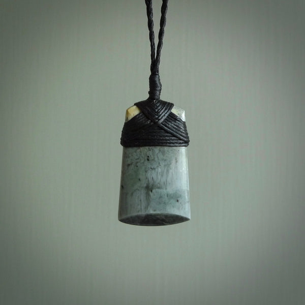 Hand made large New Zealand jade toki pendant. Hand carved in New Zealand by Raegan Bregmen. Hand made jewellery. Unique large Jade Toki with adjustable length black coloured cord. Free shipping worldwide.