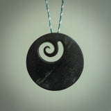 Hand made large New Zealand Pounamu, Jade Koru pendant. Hand carved in New Zealand by Rueben Tipene. Hand made jewellery. Unique large Greenstone Koru with adjustable cobalt blue/maui blue cord. Free shipping worldwide.