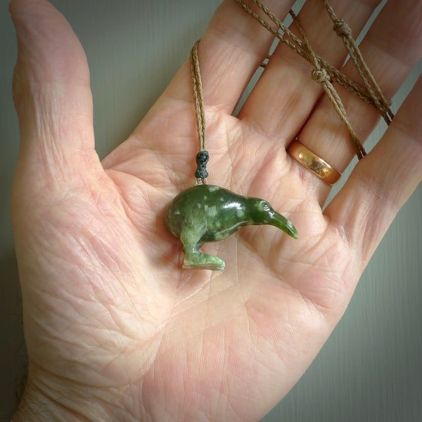 A beautiful little, handcarved kiwi pendant. This piece is carved from jade from Aceh and is a remarkably unique piece of handmade jewellery. made by NZ Pacific and for sale on our website. Shipping is free worldwide.