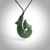Hand carved New Zealand Flower Jade Hook pendant. New Zealand Flower Jade hook necklace. Real New Zealand Pounamu hook pendant for men and women. Free worldwide delivery.