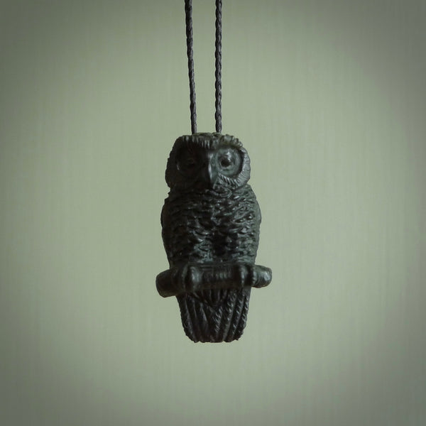 A traditional Owl design carving, hand made for us from Australian Black Jade. This is a work of art and is a collectable piece of traditional Black Jade carving. It can be worn as a special piece of jewellery or displayed. This is art made to wear at its finest. A unisex pendant for owl lovers.