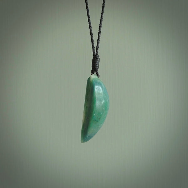 This is a handcrafted aotea stone drop pendant. This is a solid little work of art. We ship this worldwide for free and are happy to answer any questions that you may have about these or other products on our website.