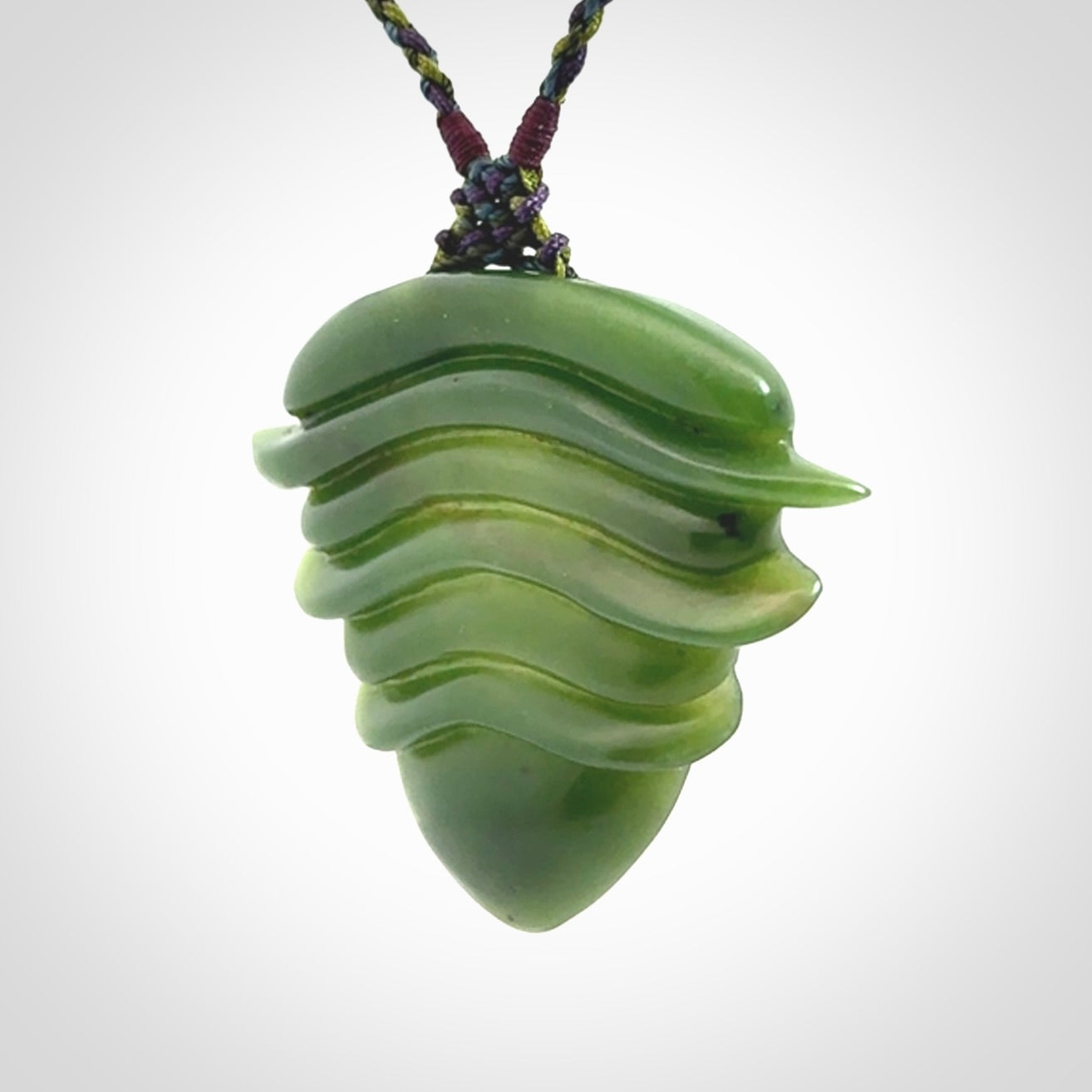 Hand carved New Zealand Jade drop pendant with adjustable cord. Free shipping worldwide.