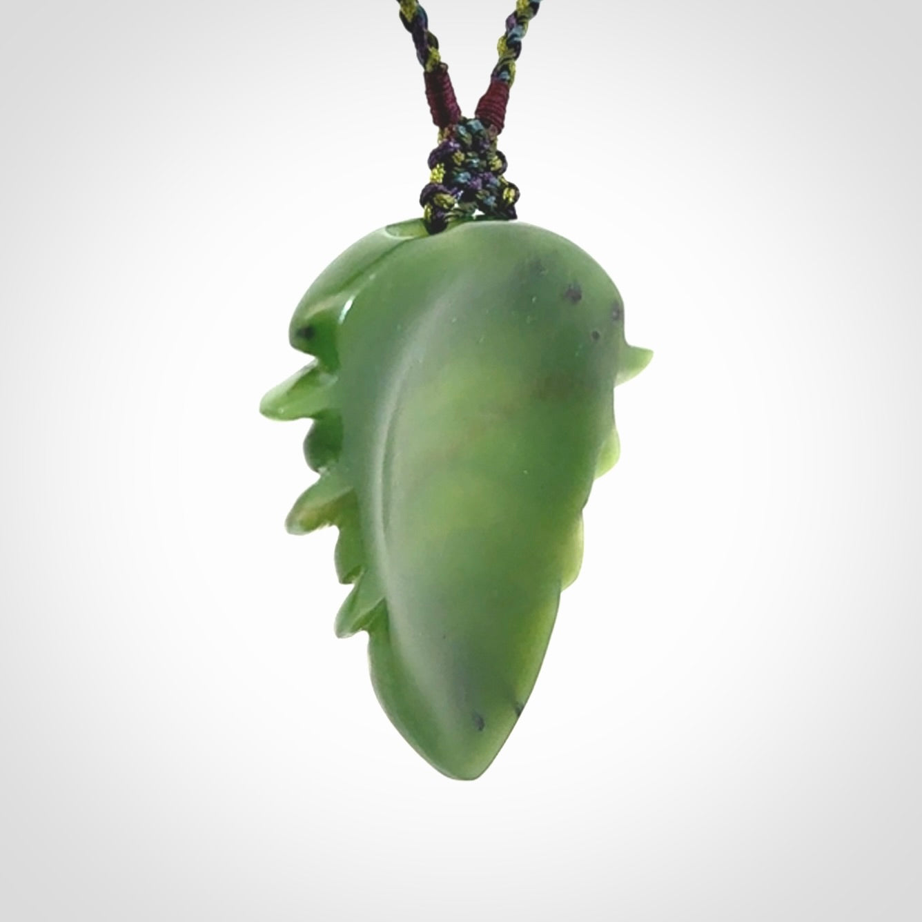 Hand carved New Zealand Jade drop pendant with adjustable cord. Free shipping worldwide.