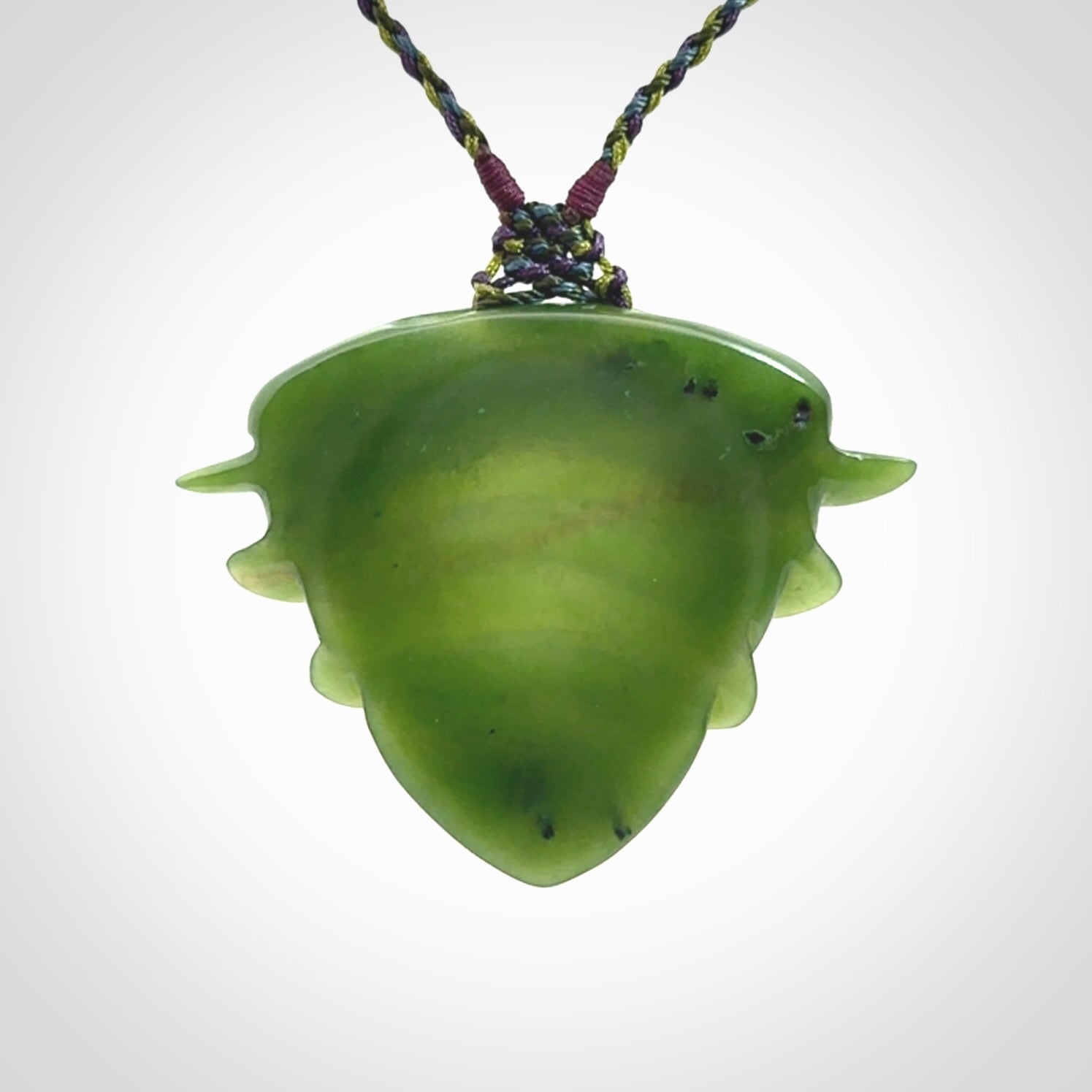 Hand carved New Zealand Jade drop pendant with adjustable cord. Free shipping worldwide.