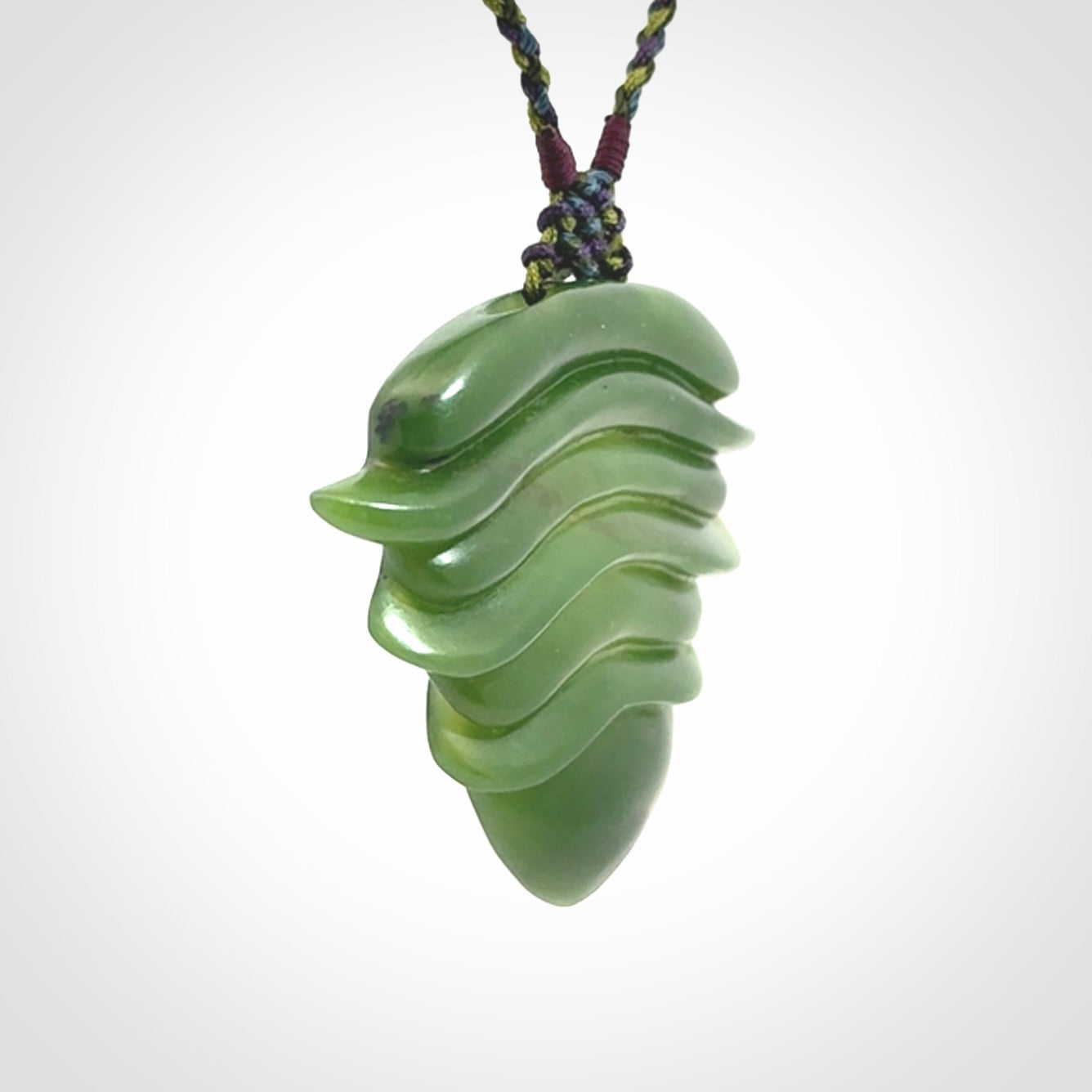 Hand carved New Zealand Jade drop pendant with adjustable cord. Free shipping worldwide.