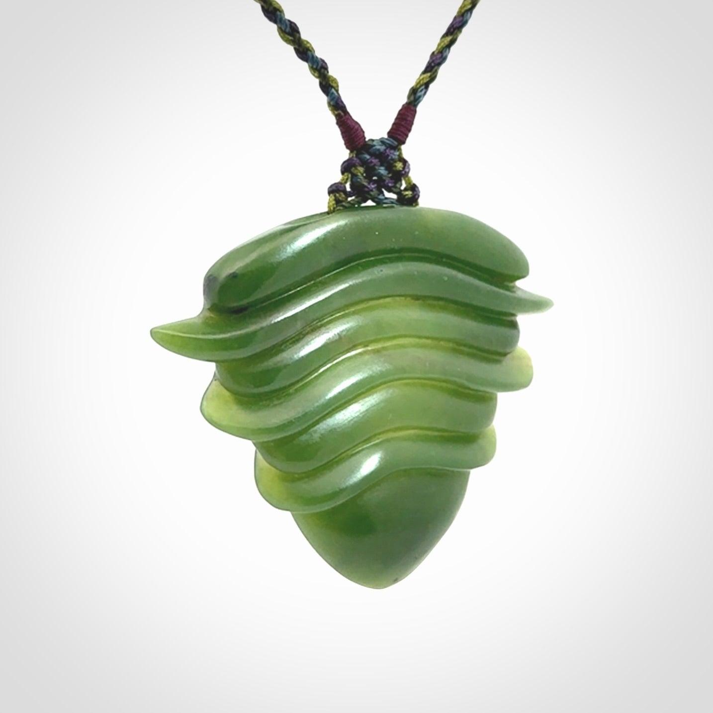 Hand carved New Zealand Jade drop pendant with adjustable cord. Free shipping worldwide.