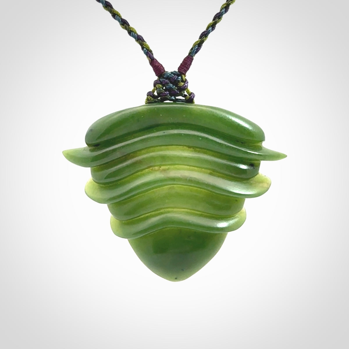 Hand carved New Zealand Jade drop pendant with adjustable cord. Free shipping worldwide.
