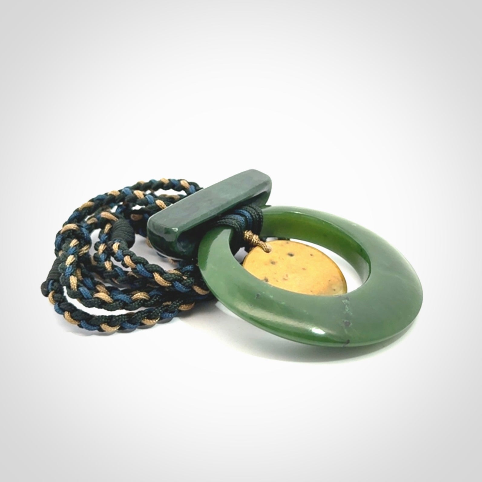 Hand carved New Zealand Jade peace bell pendant with adjustable cord. Free shipping worldwide.