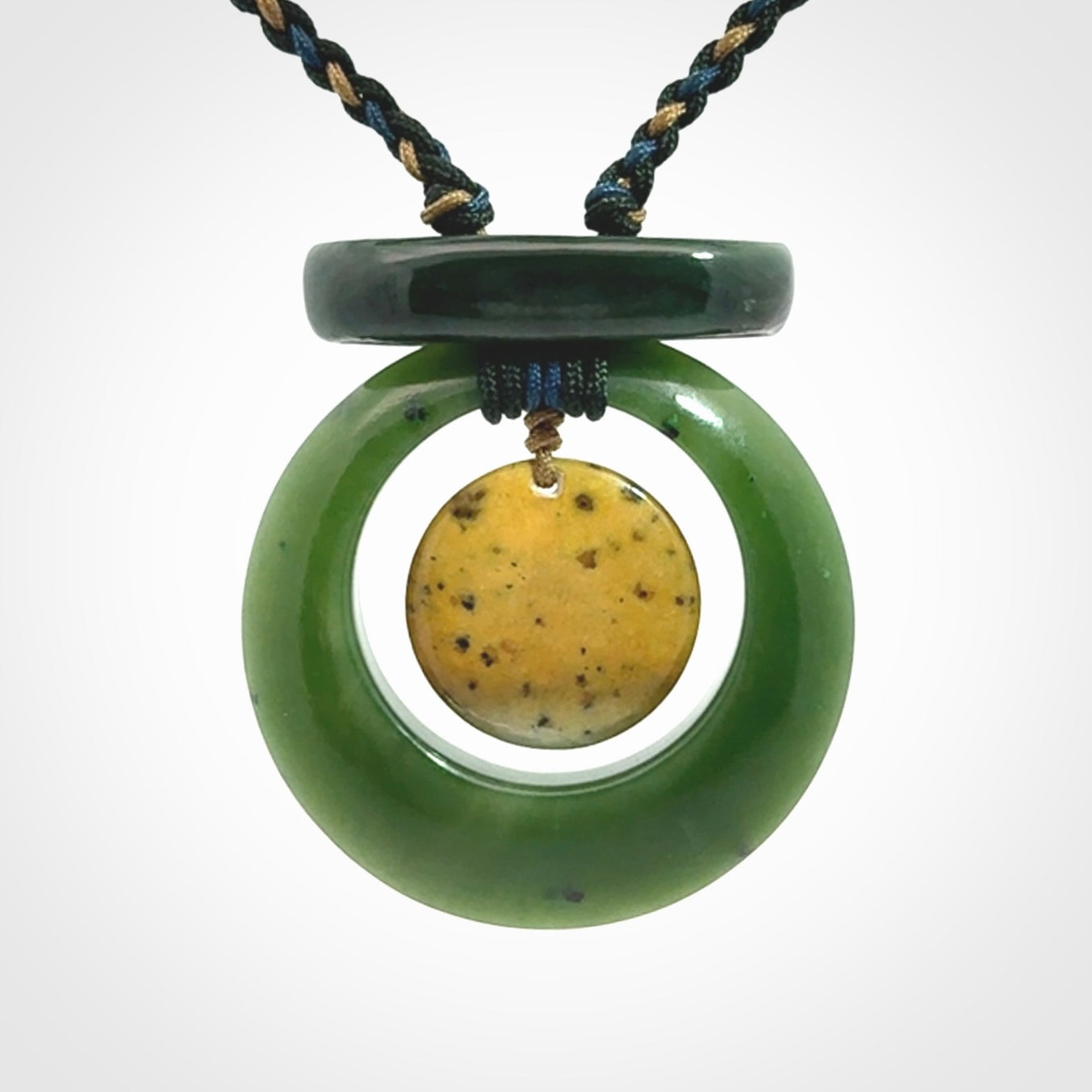 Hand carved New Zealand Jade peace bell pendant with adjustable cord. Free shipping worldwide.