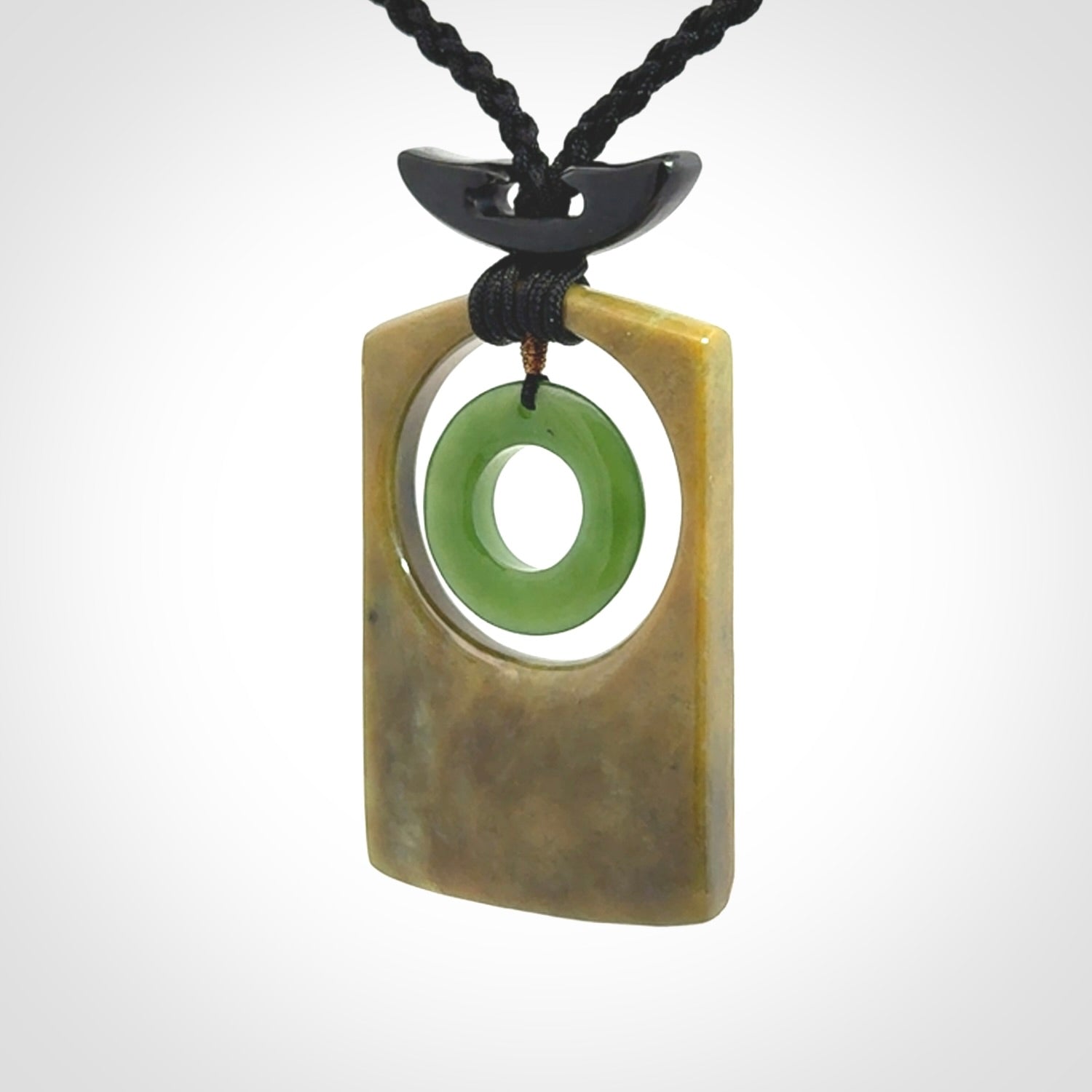 Hand carved New Zealand Jade pendant with adjustable cord. Free shipping worldwide.