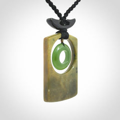 Hand carved New Zealand Jade pendant with adjustable cord. Free shipping worldwide.