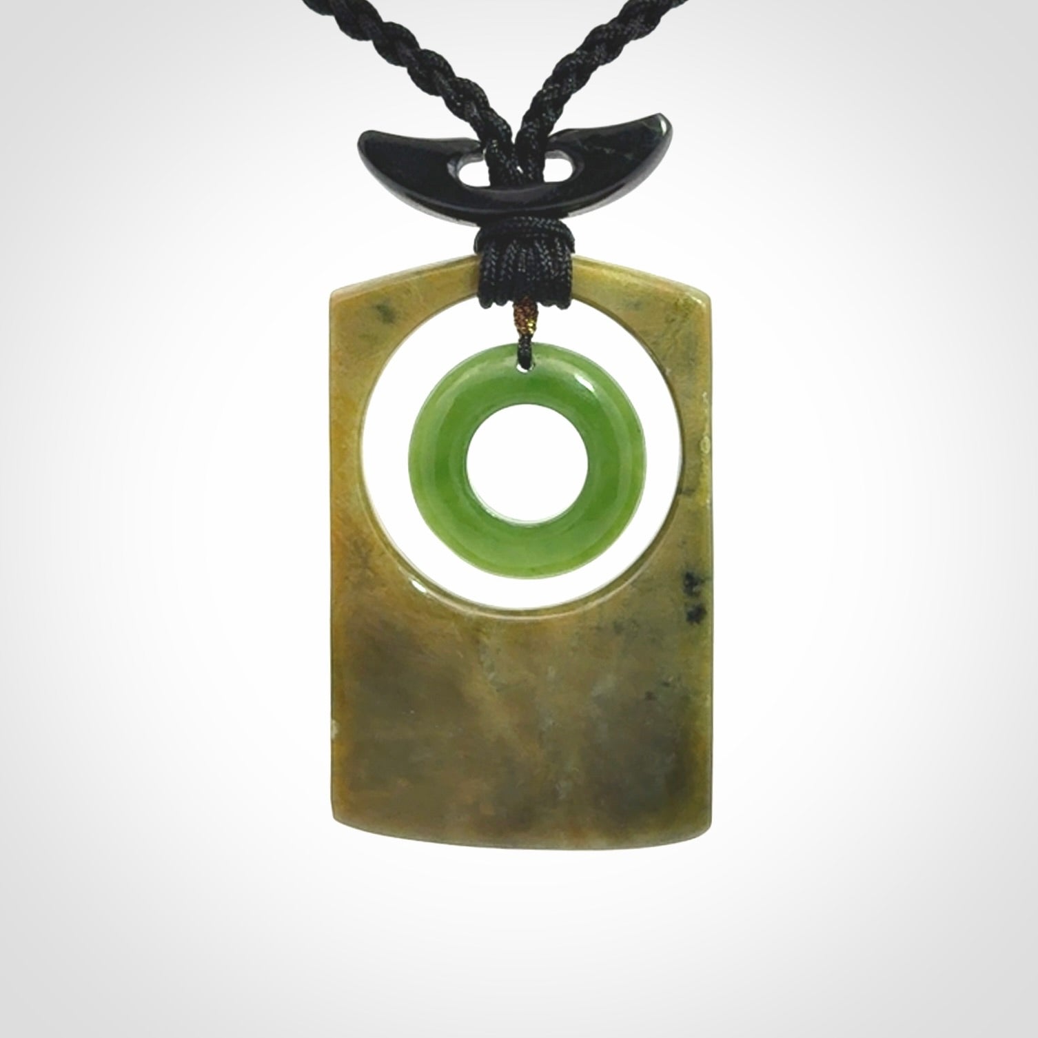 Hand carved New Zealand Jade pendant with adjustable cord. Free shipping worldwide.