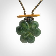 Hand carved New Zealand Jade flower pendant with adjustable cord. Free shipping worldwide.