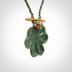 Hand carved New Zealand Jade flower pendant with adjustable cord. Free shipping worldwide.