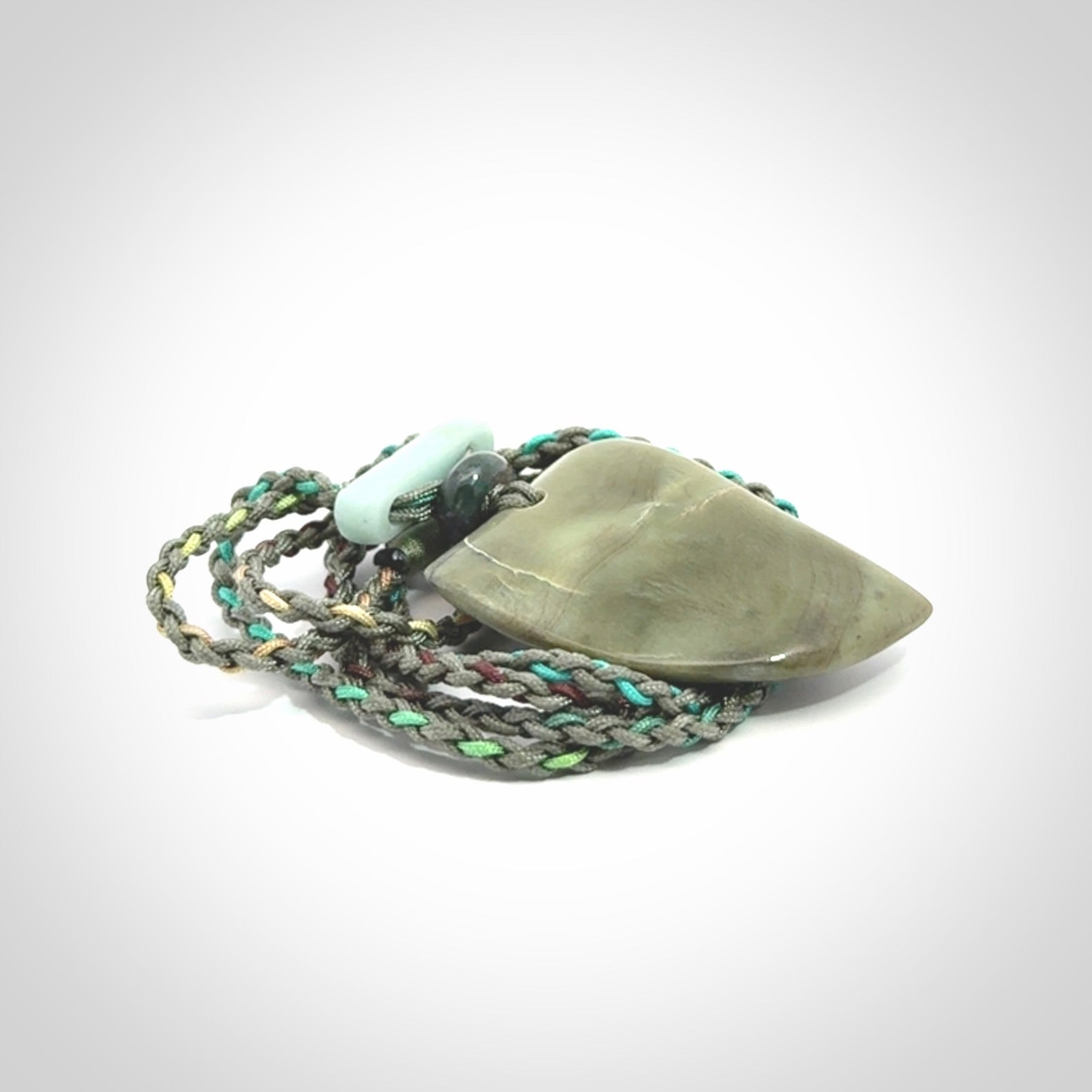 Hand carved New Zealand Jade drop pendant with adjustable cord. Free shipping worldwide.