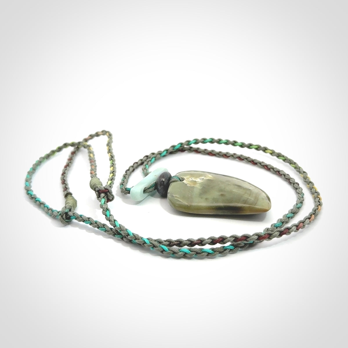 Hand carved New Zealand Jade drop pendant with adjustable cord. Free shipping worldwide.