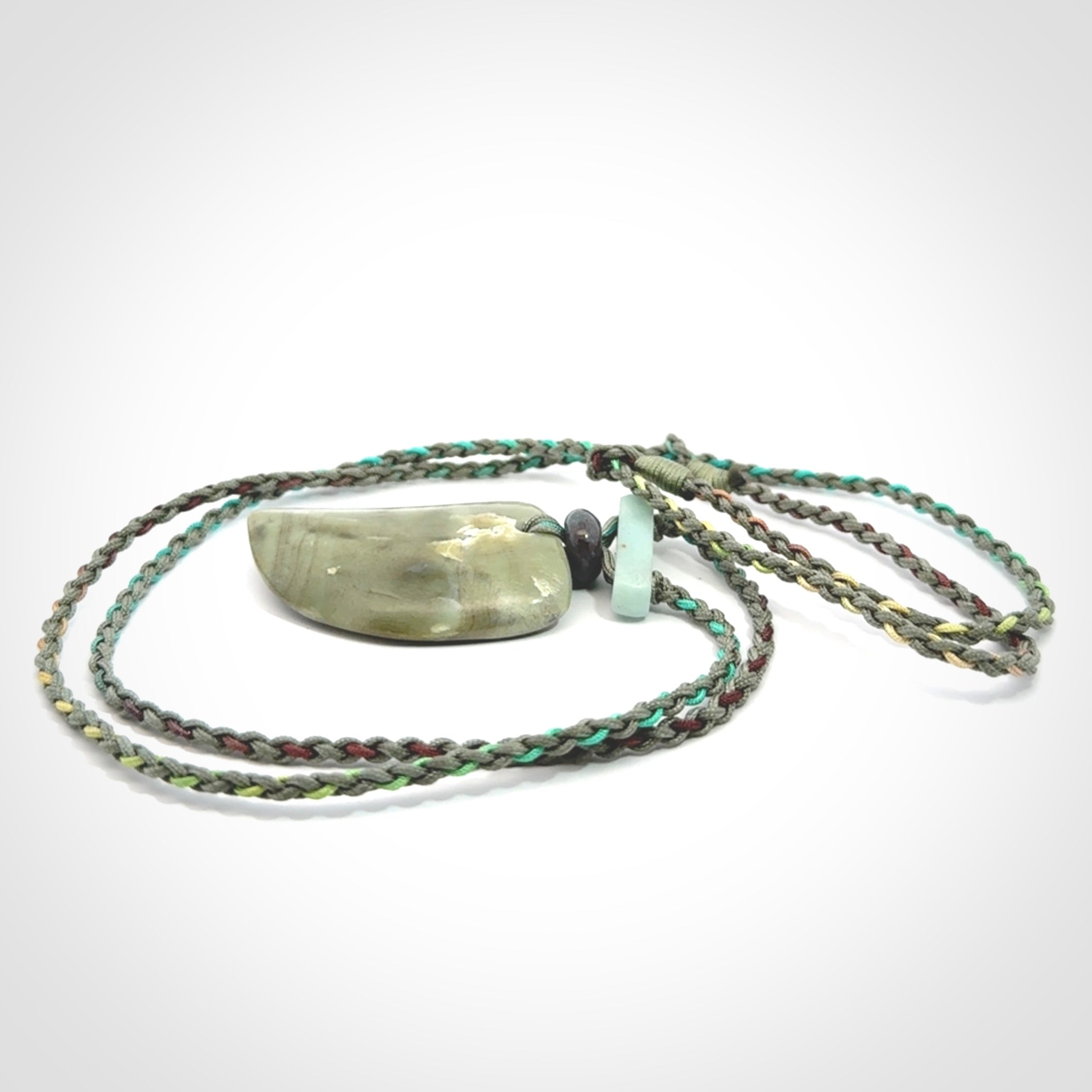 Hand carved New Zealand Jade drop pendant with adjustable cord. Free shipping worldwide.