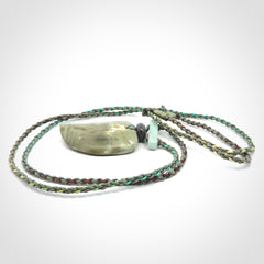 Hand carved New Zealand Jade drop pendant with adjustable cord. Free shipping worldwide.