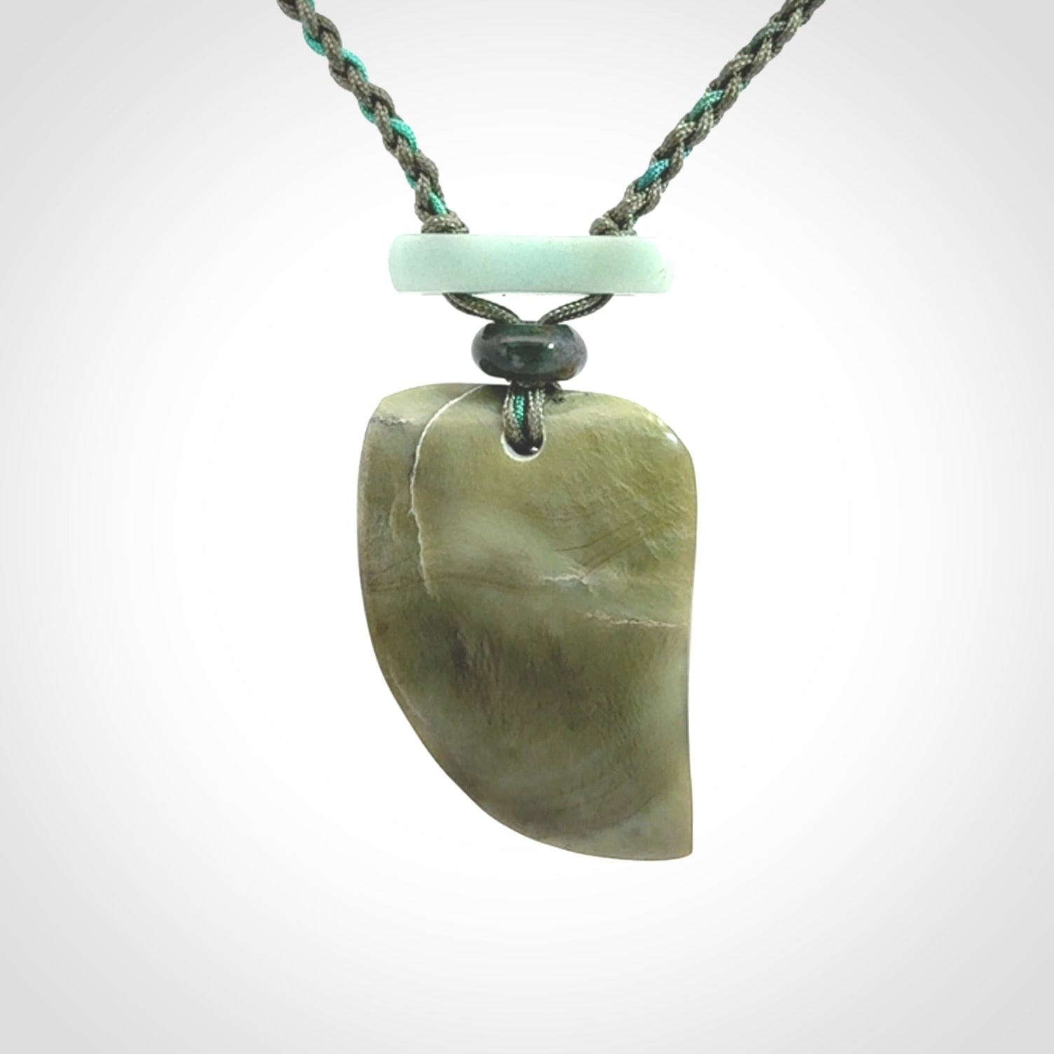 Hand carved New Zealand Jade drop pendant with adjustable cord. Free shipping worldwide.