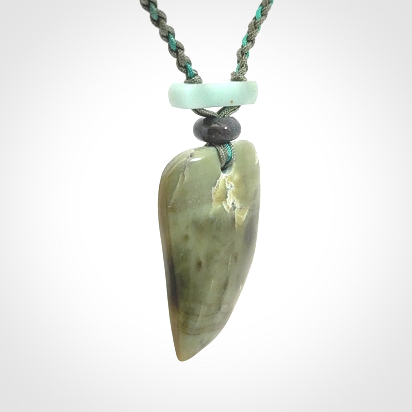 Hand carved New Zealand Jade drop pendant with adjustable cord. Free shipping worldwide.