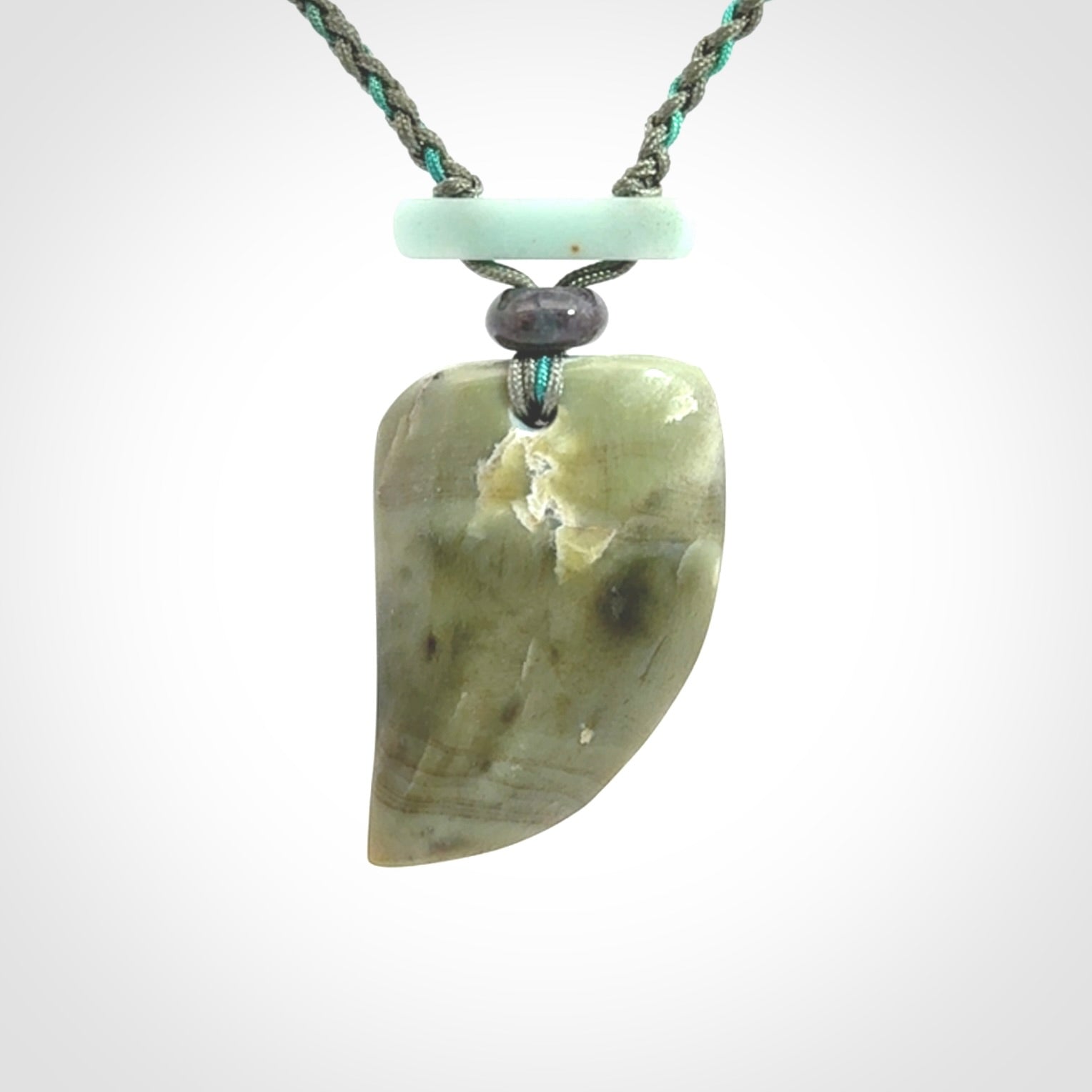 Hand carved New Zealand Jade drop pendant with adjustable cord. Free shipping worldwide.
