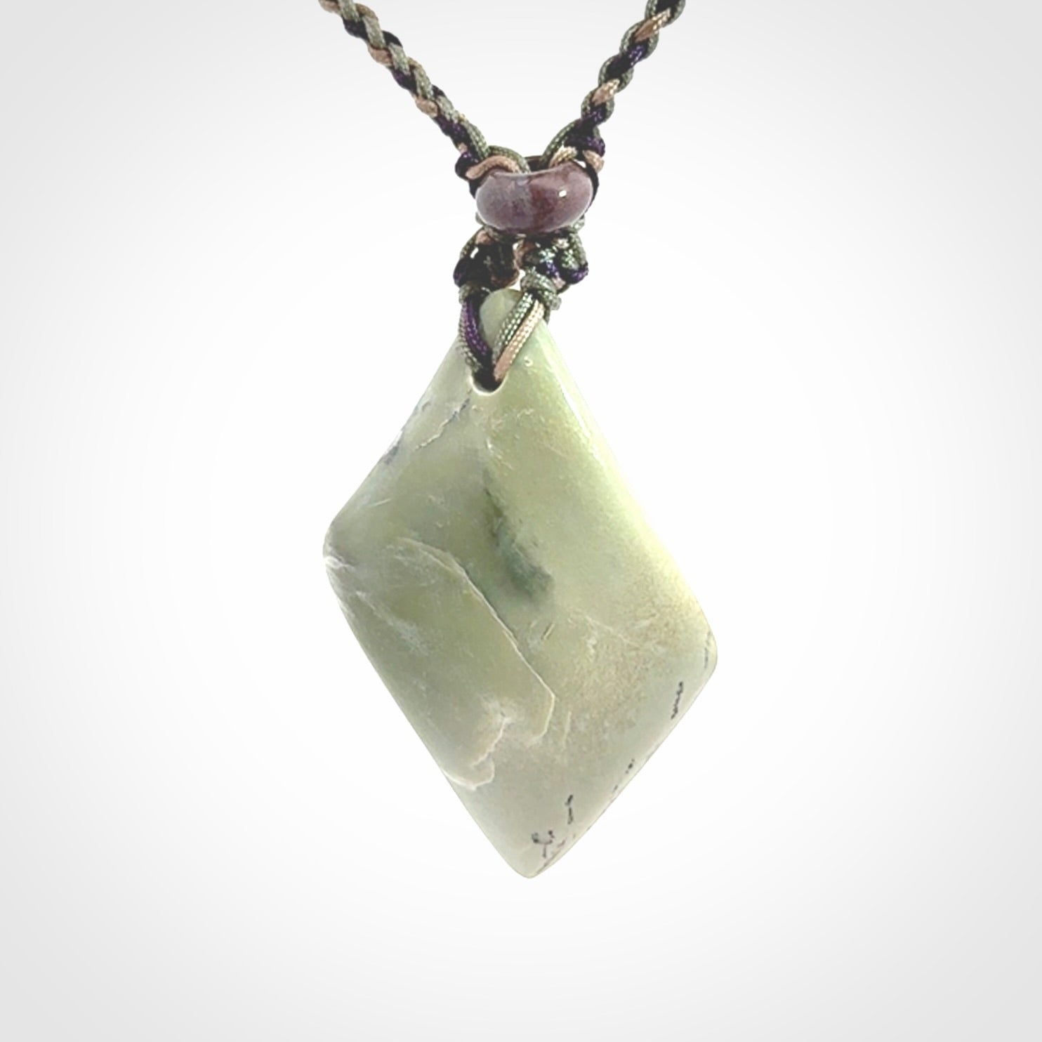 Hand carved New Zealand Jade drop pendant with adjustable cord. Free shipping worldwide.
