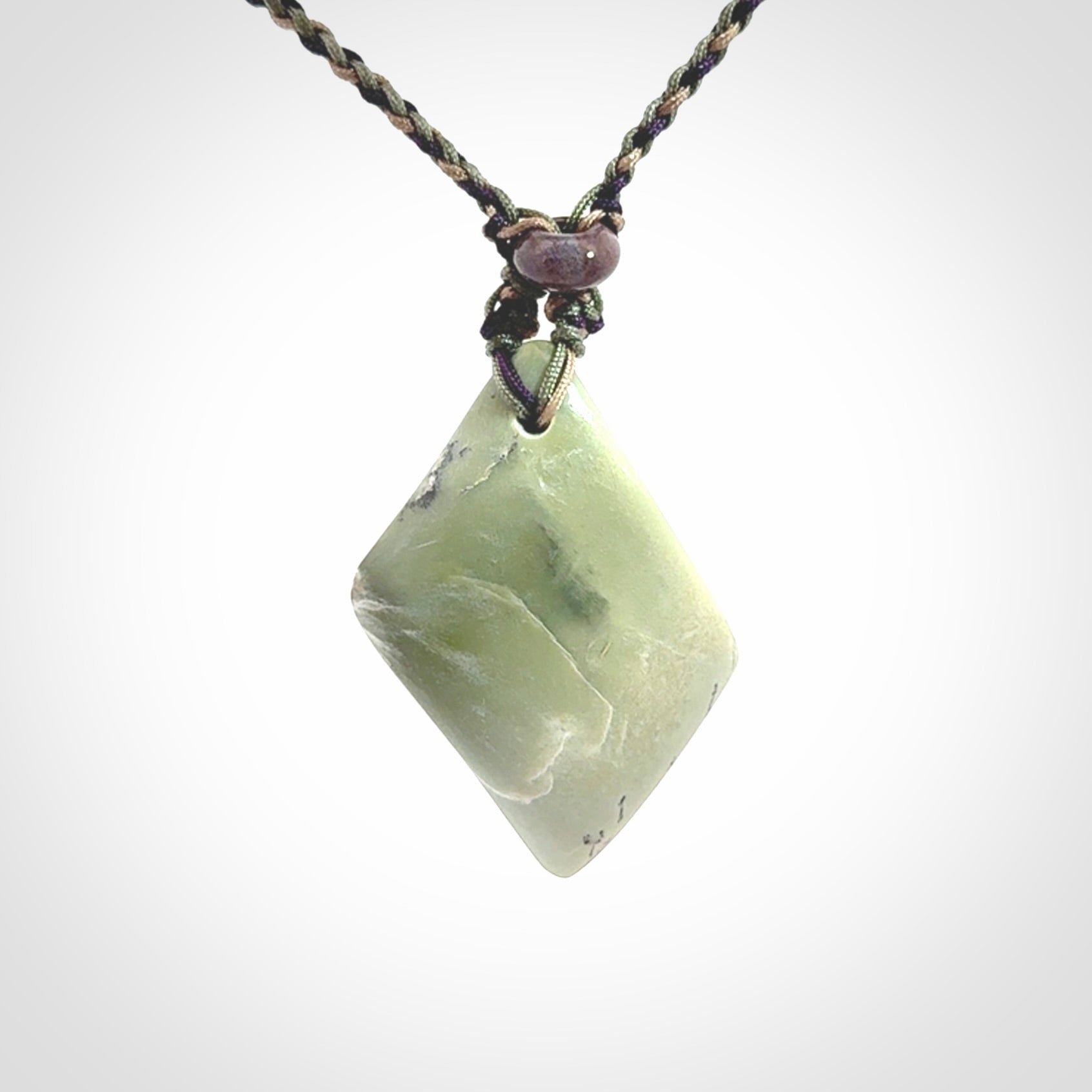 Hand carved New Zealand Jade drop pendant with adjustable cord. Free shipping worldwide.