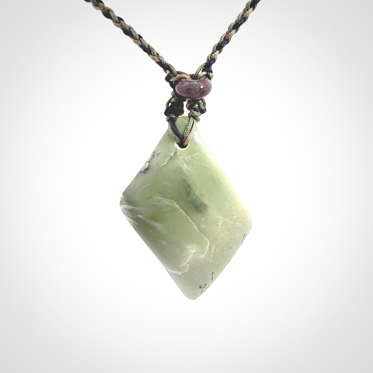 Hand carved New Zealand Jade drop pendant with adjustable cord. Free shipping worldwide.