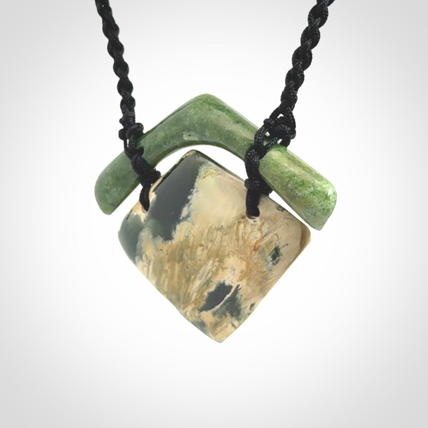 Hand carved New Zealand Jade drop pendant with adjustable cord. Free shipping worldwide.