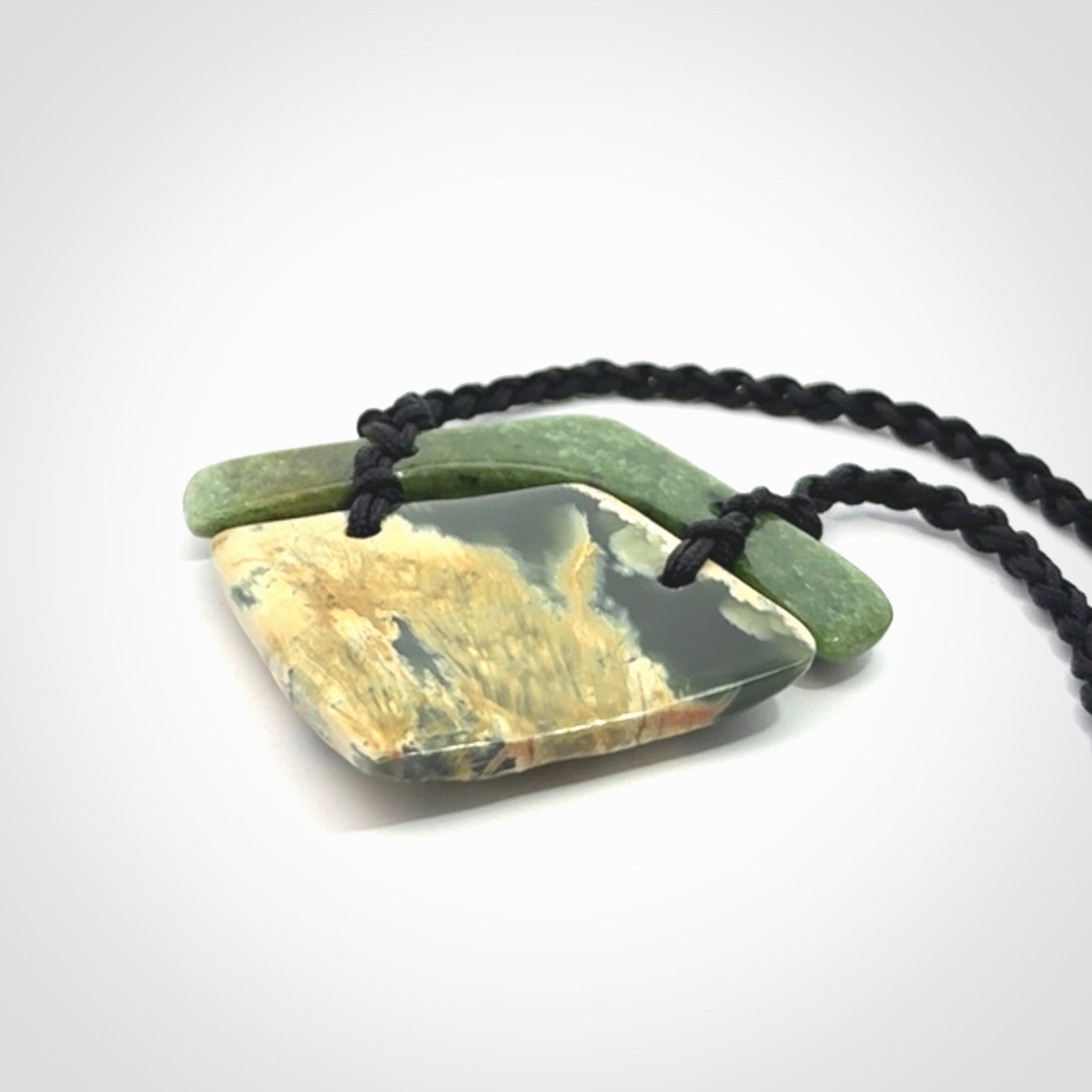 Hand carved New Zealand Jade drop pendant with adjustable cord. Free shipping worldwide.