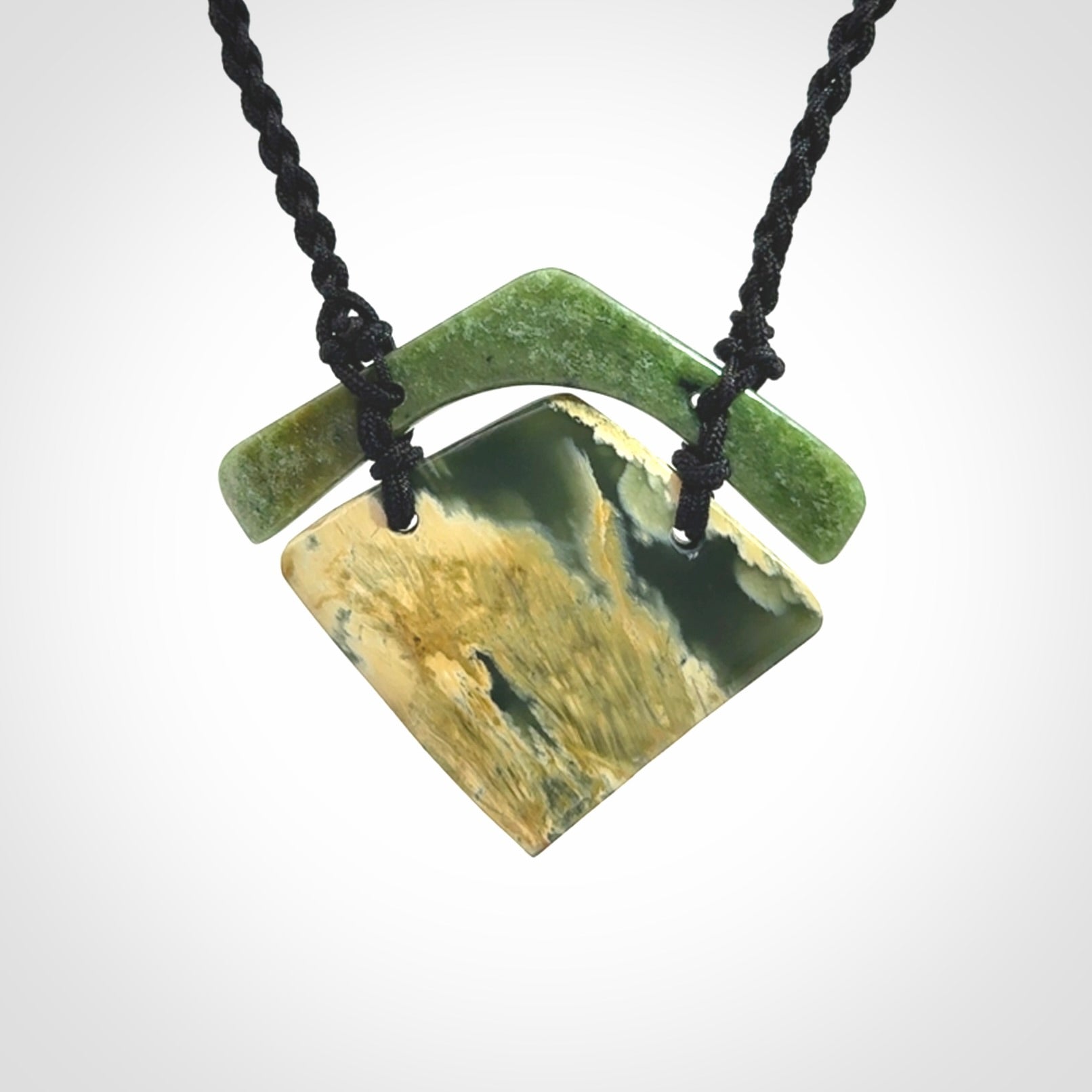 Hand carved New Zealand Jade drop pendant with adjustable cord. Free shipping worldwide.