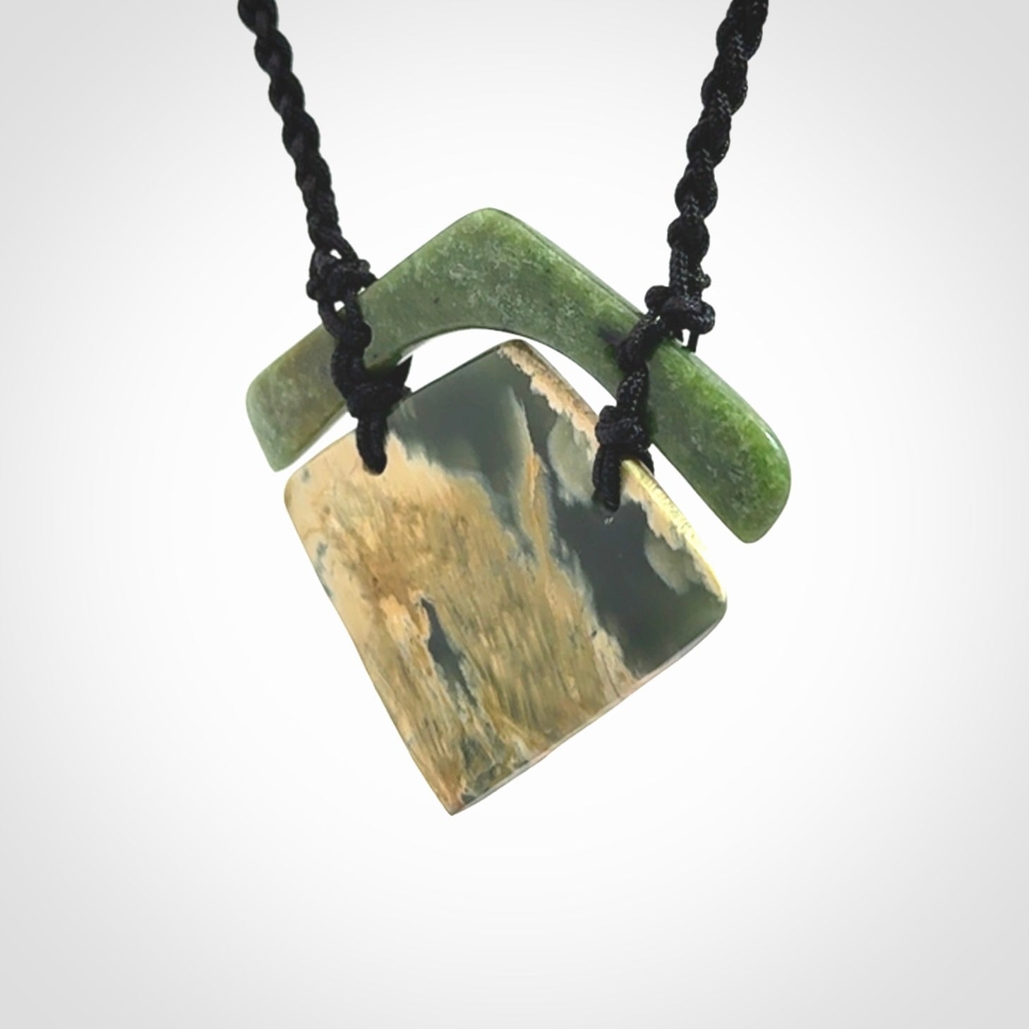 Hand carved New Zealand Jade drop pendant with adjustable cord. Free shipping worldwide.