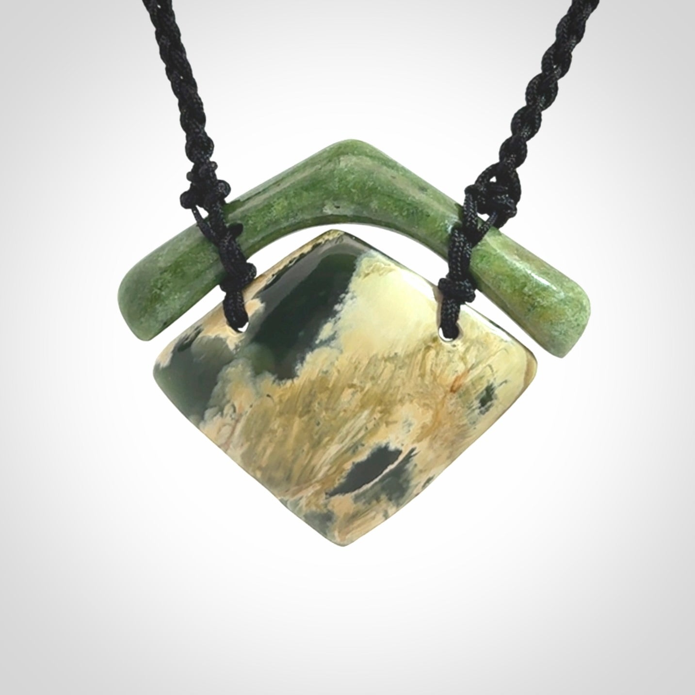 Hand carved New Zealand Jade drop pendant with adjustable cord. Free shipping worldwide.