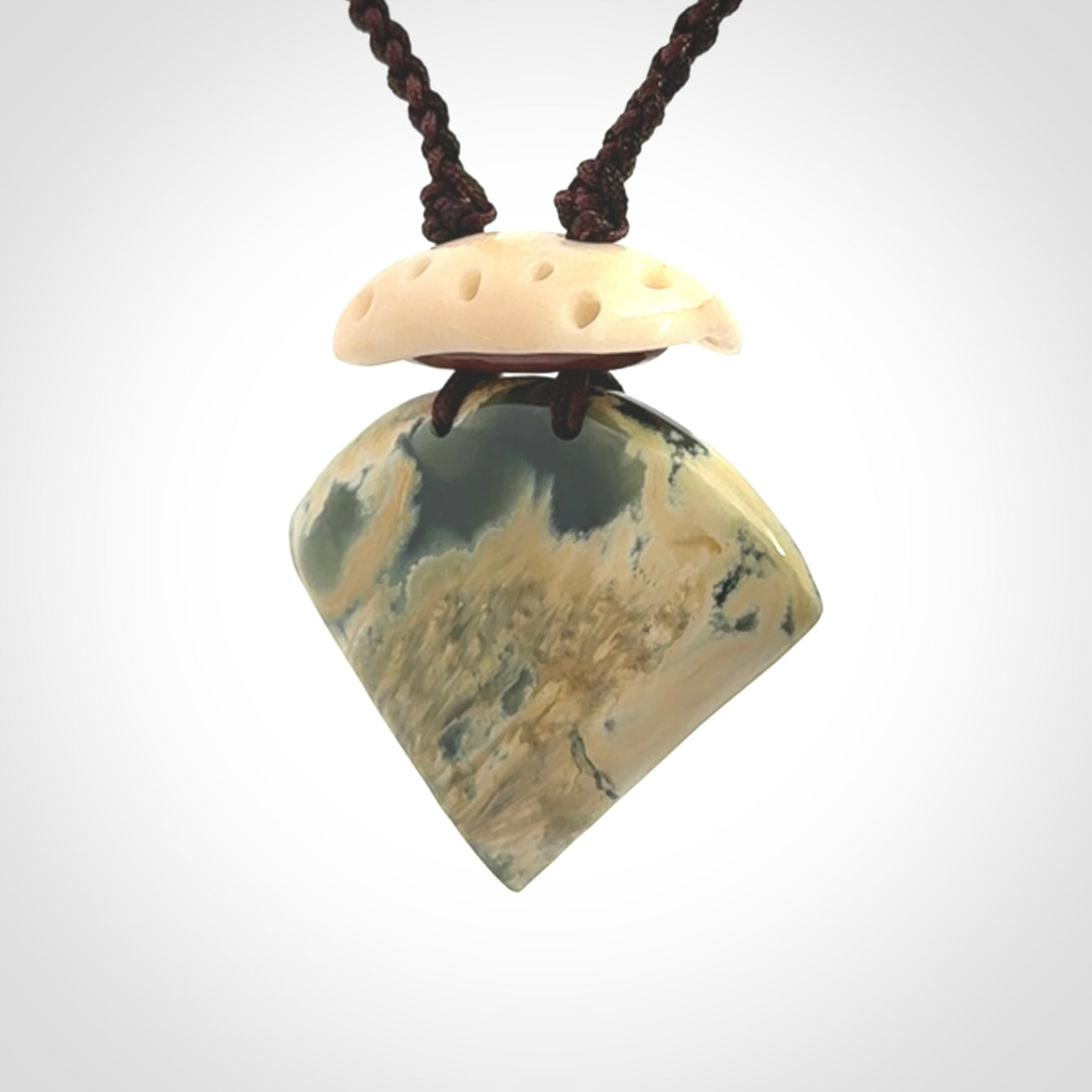 Hand carved New Zealand Jade drop pendant with adjustable cord. Free shipping worldwide.