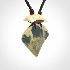 Hand carved New Zealand Jade drop pendant with adjustable cord. Free shipping worldwide.