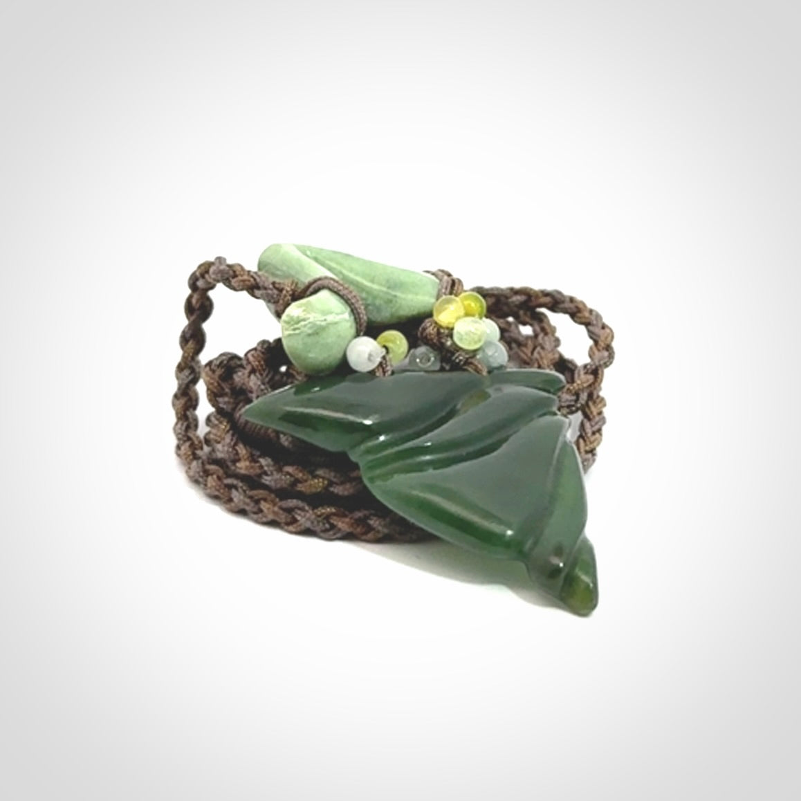 Hand carved New Zealand Jade drop pendant with adjustable cord. Free shipping worldwide.