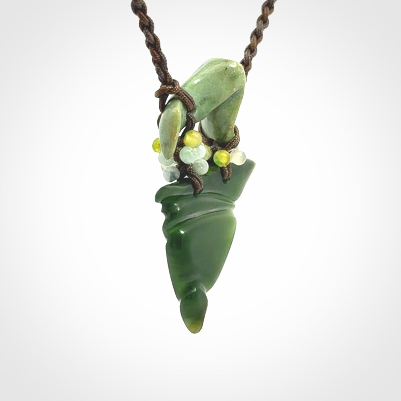 Hand carved New Zealand Jade drop pendant with adjustable cord. Free shipping worldwide.