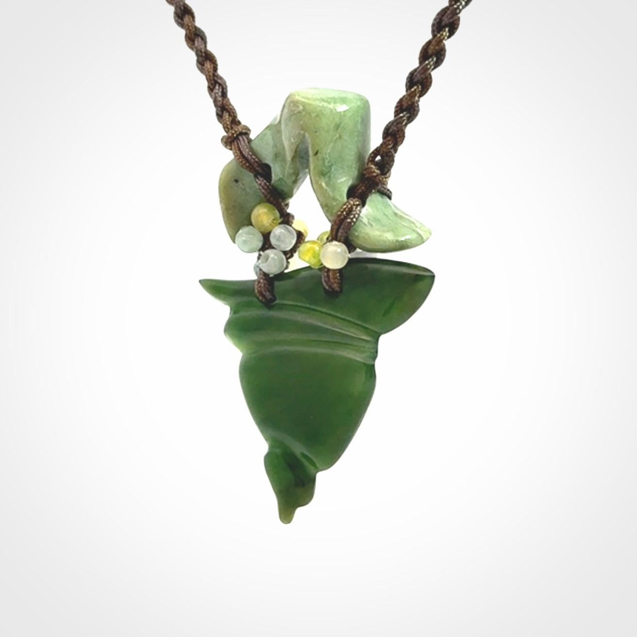 Hand carved New Zealand Jade drop pendant with adjustable cord. Free shipping worldwide.