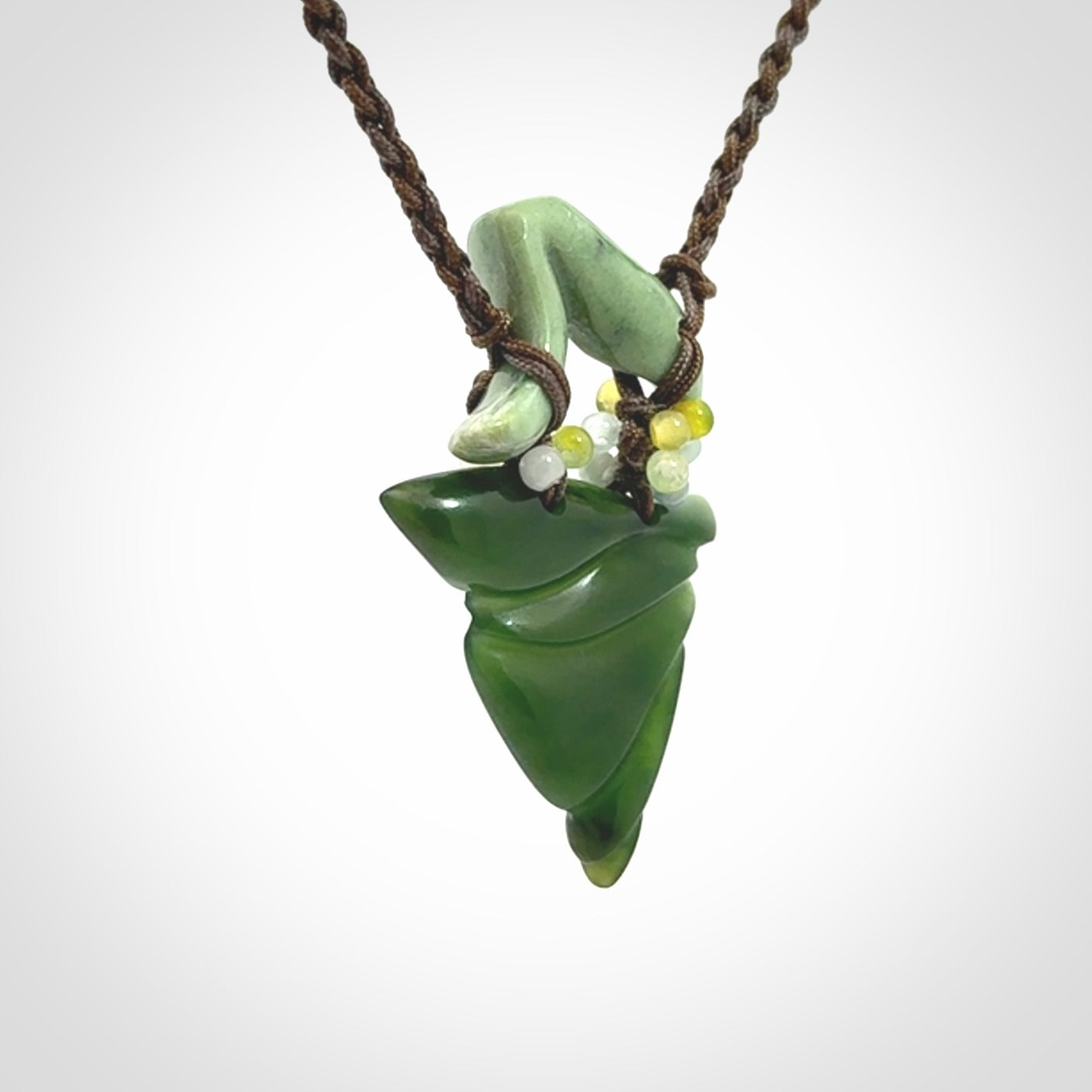 Hand carved New Zealand Jade drop pendant with adjustable cord. Free shipping worldwide.