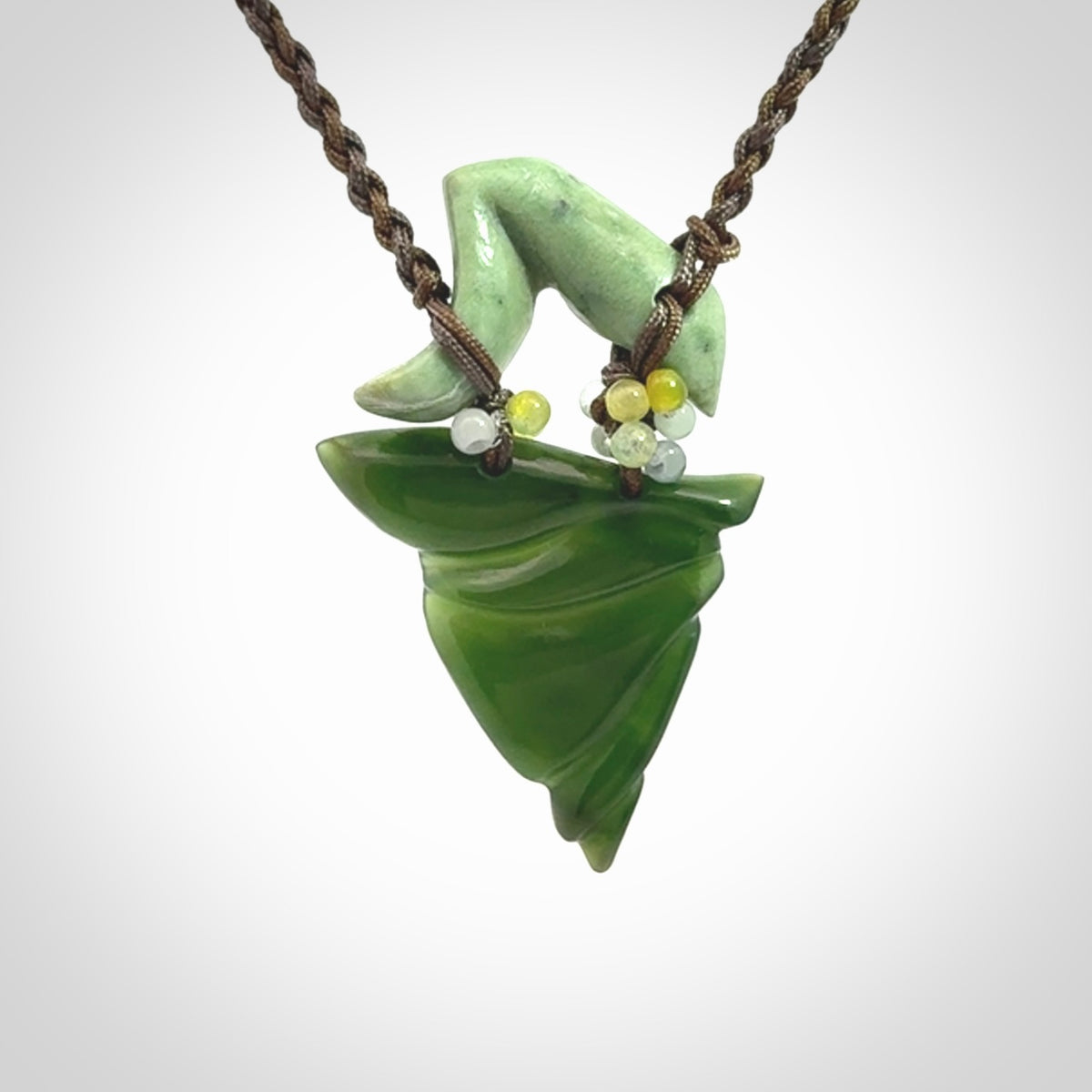 Hand carved New Zealand Jade drop pendant with adjustable cord. Free shipping worldwide.