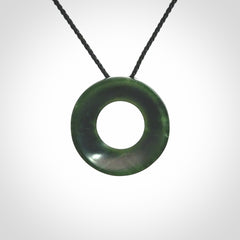 Hand carved contemporary pendant from a lovely dark piece of New Zealand Jade.